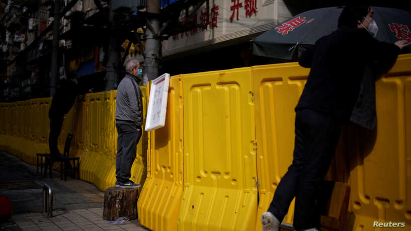 Ekspertë të OBSH e pranojnë: Tregu i Wuhanit ka luajtur rol në shpërthimin e COVID-19